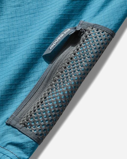 And Wander Blue Breath Rip Pullover Jacket Light for men