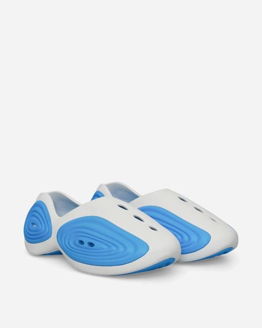 CROCSTM Blue Ripple Clogs Neon Ocean for men