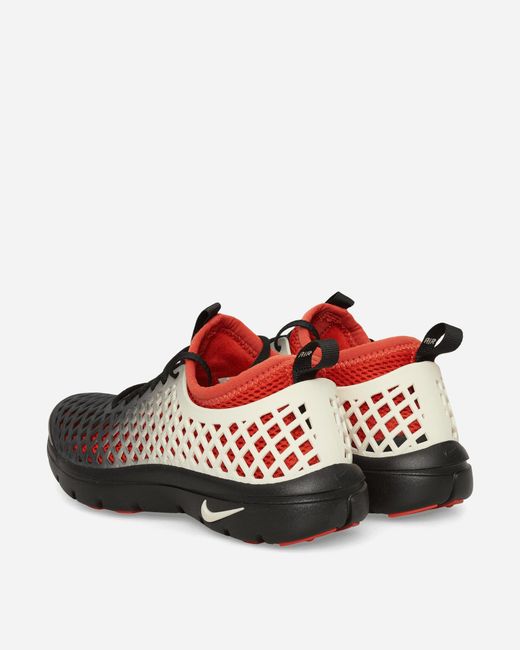Nike Red Women S Rejuven8 Sneakers / Rust Factor