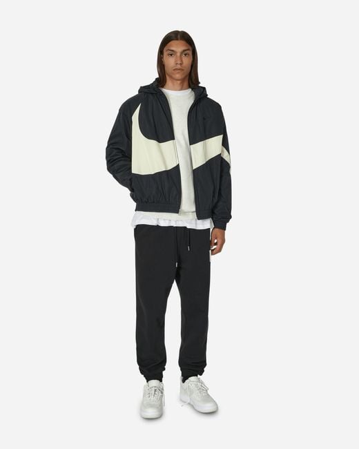 coconut milk swoosh tracksuit