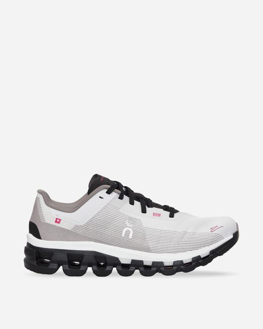 On Cloudflow 4 Distance Sneakers Black / White for men