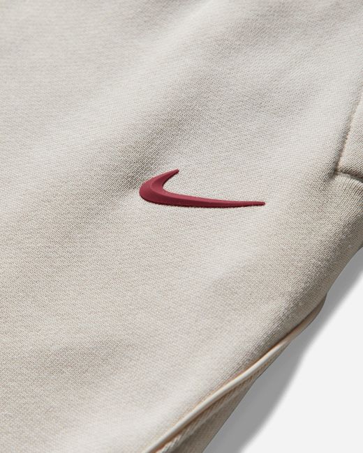 Nike White Men S Nocta Open Hem Fleece Pants Light Orewood Brown for men