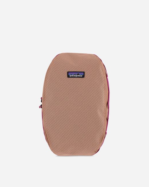 Patagonia Natural Black Hole Cube 6l Peach Sherbet for men