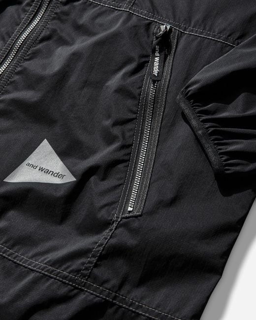 And Wander Black Men S Pertex Wind Jacket for men
