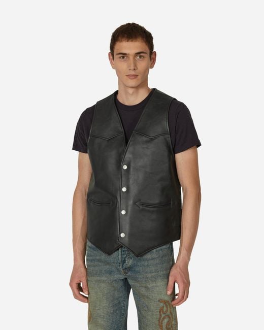 Denim and shop leather vest