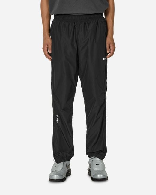 Nike Nocta Woven Track Pants in Black for Men | Lyst