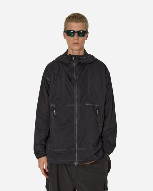 And Wander Black Pertex Wind Jacket for men