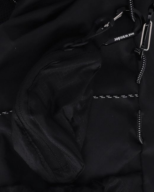 And Wander Black Ecopak 30l Backpack for men
