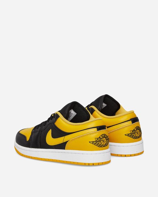 Nike Yellow Air Jordan 1 Low Sneakers / Ochre for men