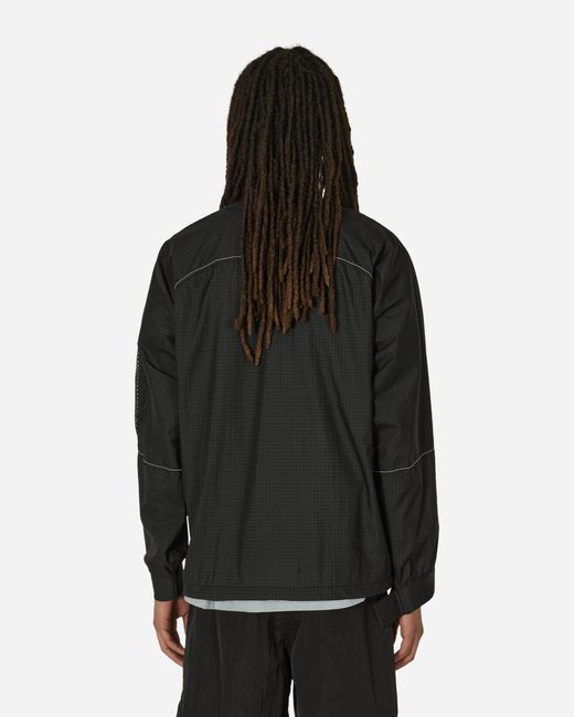 And Wander Black Breath Rip Pullover Jacket for men