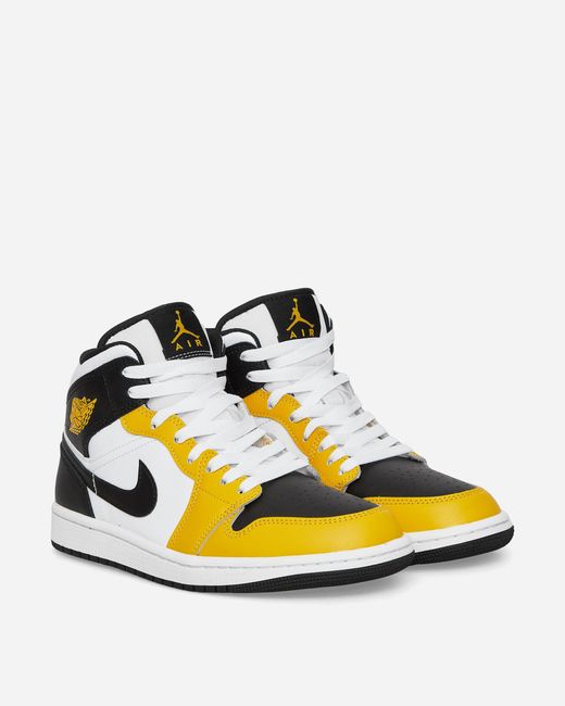Nike Yellow Air Jordan 1 Mid Sneakers Ochre for men