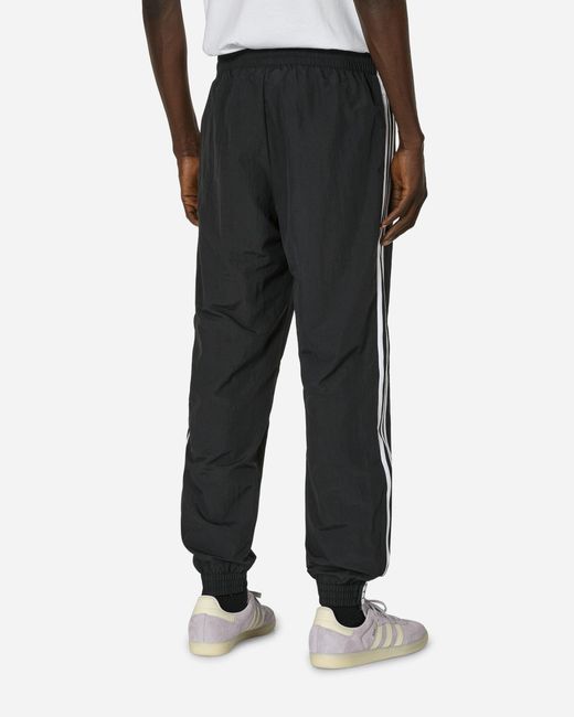 Adidas Black Woven Firebird Track Pants for men