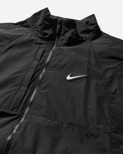 Nike Black Nocta Woven Track Jacket for men