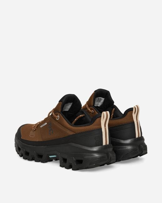 On Shoes Brown Cloudrock Low Wp Sneakers Earth for men