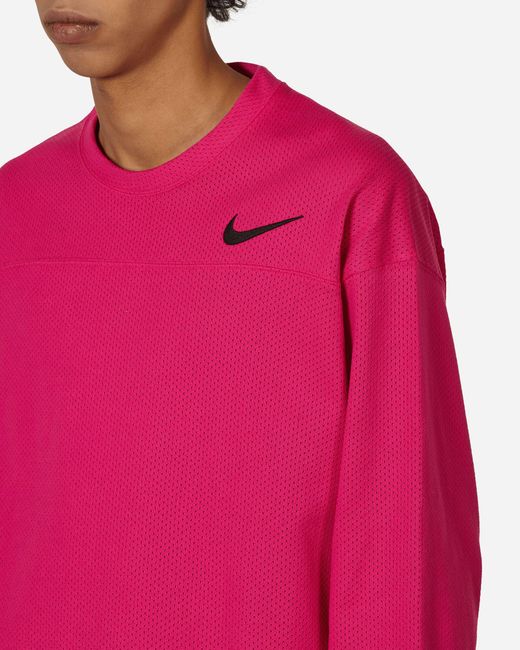 nike pink flame crewneck