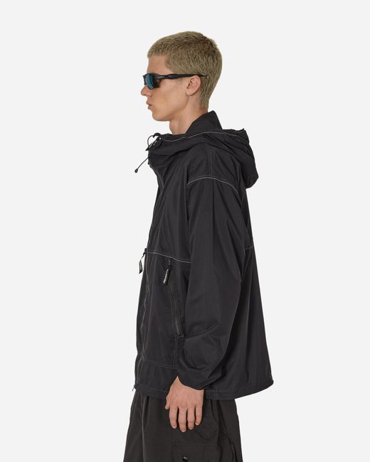 And Wander Black Pertex Wind Jacket for men