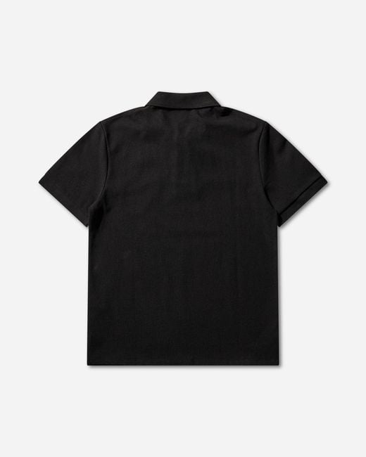 Umbro Black 001% Fair Polo for men
