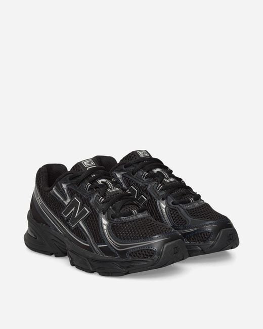 New Balance Black 740 Sneakers Metallic for men