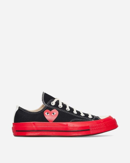 black converse with red heart