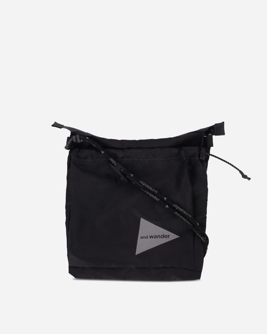 And Wander Black Crispy Rip Sacoche for men