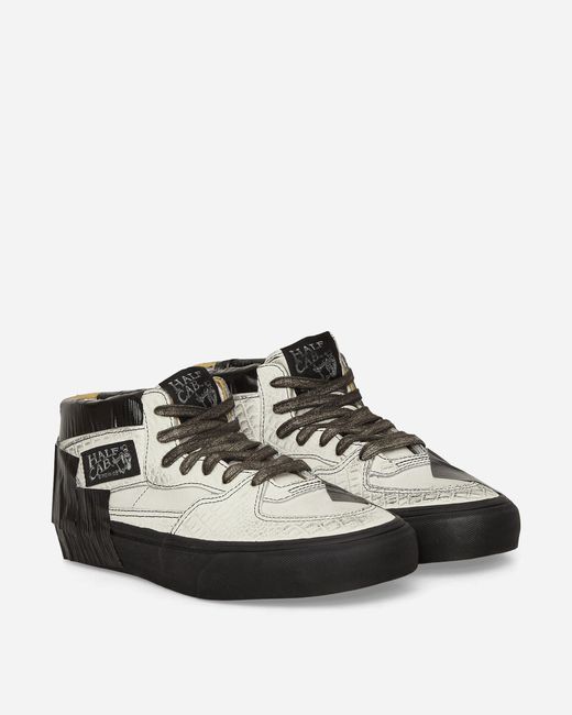 Vans half cab white black deals sole