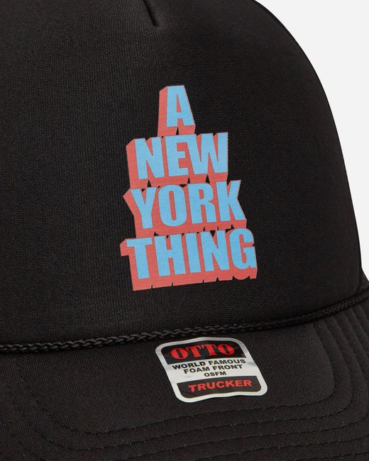 Anything Black Stacked Trucker Hat for men