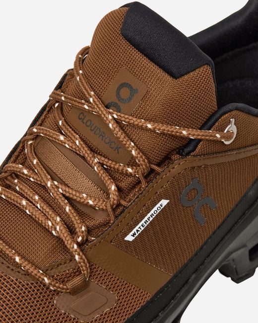On Shoes Brown Cloudrock Low Wp Sneakers Earth for men