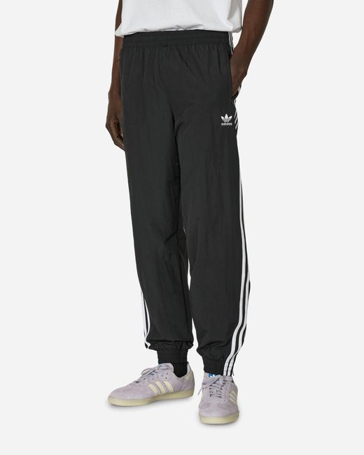 Adidas Black Woven Firebird Track Pants for men