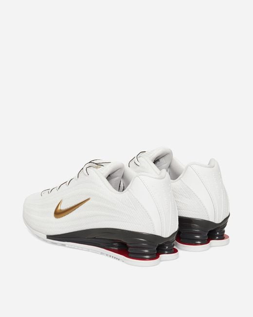 Nike Women S Shox Z Sneakers White / Metallic Gold