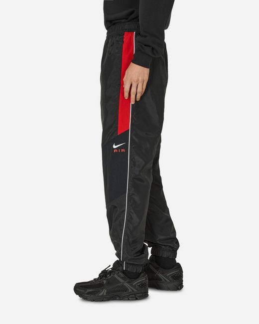 Nike Air Woven Pants Black / University Red for men