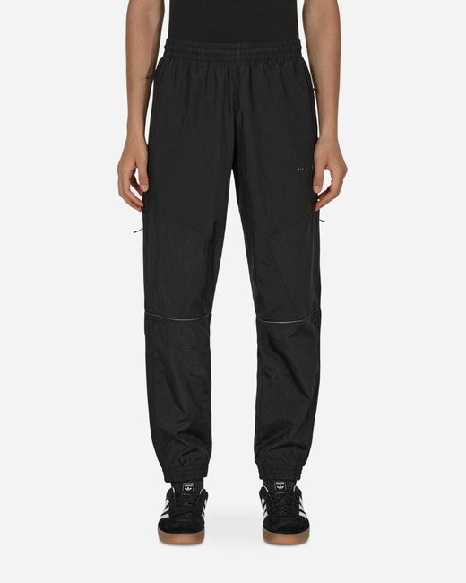 adidas Originals Synthetic Reveal Material Mix Track Pants in Black for