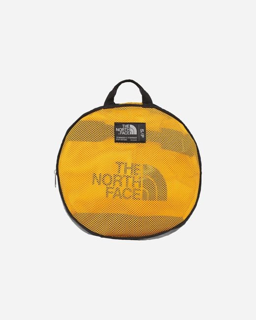 The North Face Yellow Small Base Camp Duffel Bag Summit Gold for men