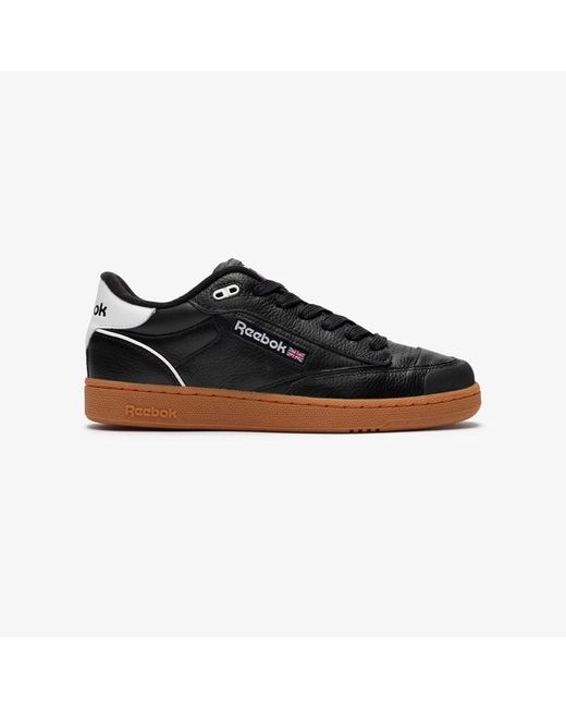 Reebok black gum sole top
