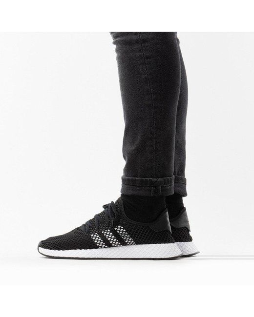 black deerupt trainers