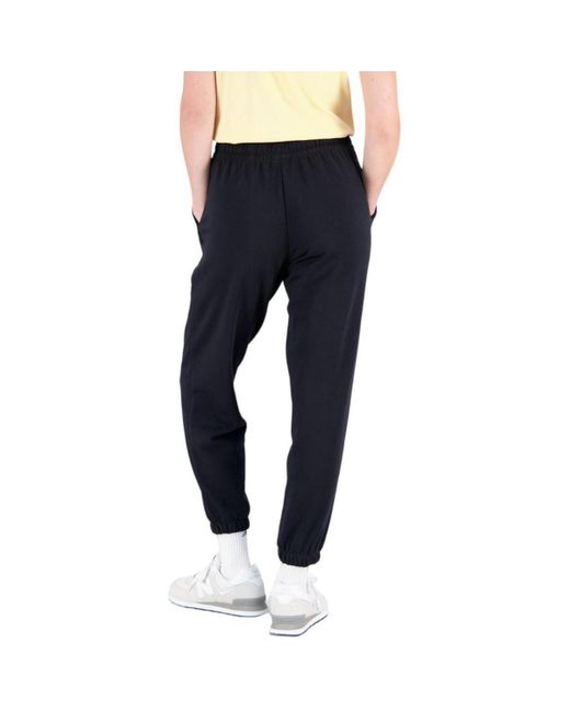 Pantalon New Balance en coloris Blue