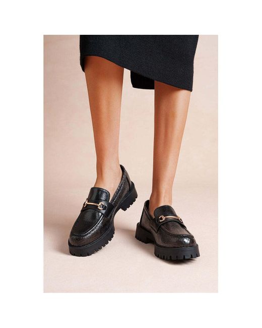 Ballerines Loafer Mocassin effet serpent semelle crantée, Noir Vera Collection en coloris Black