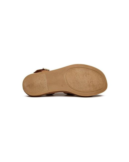 Sandales plates Norma Des Sandales Sole en coloris Brown