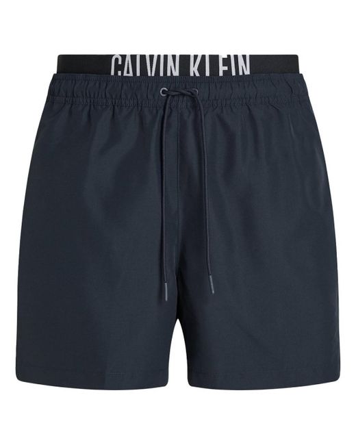 Maillots de bain KM0KM01093 Calvin Klein pour homme en coloris Blue