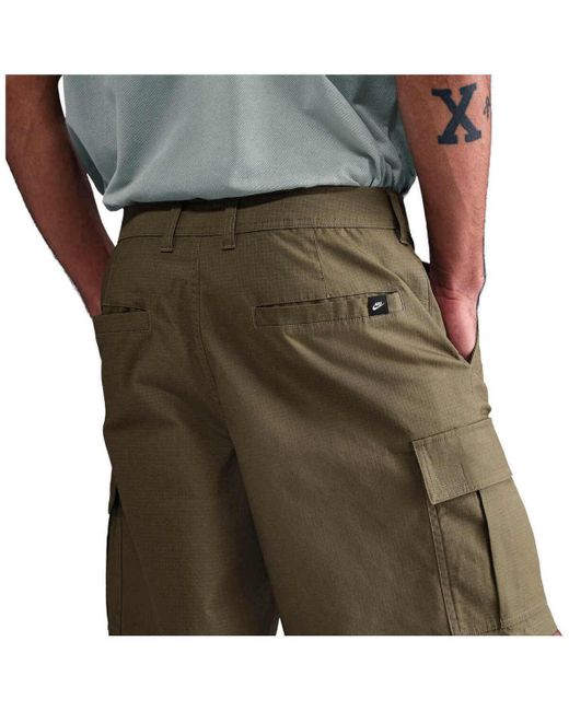 Short M NK CLUB WVN CARGO SHORT Nike pour homme en coloris Black