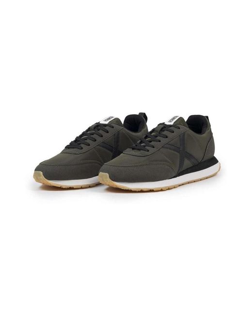 Baskets basses Munich pour homme en coloris Black