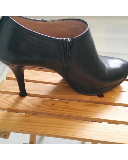 Boots Boots en cuir TBE CafeNoir en coloris Gray