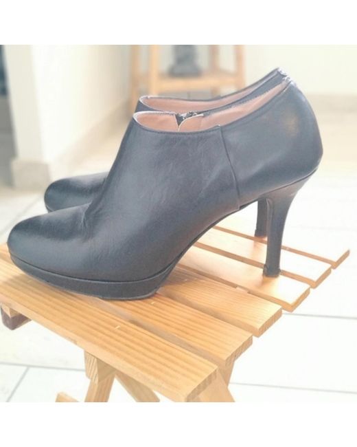 Boots Boots en cuir TBE CafeNoir en coloris Gray