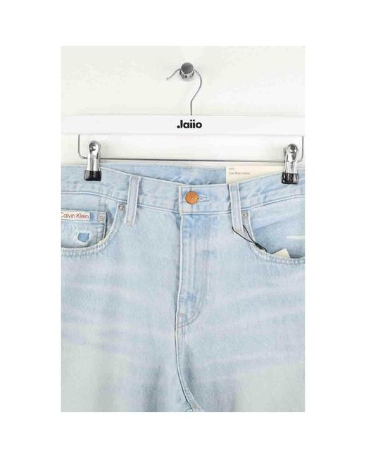 Jeans flare / larges Pantalon large bleu Calvin Klein en coloris Blue