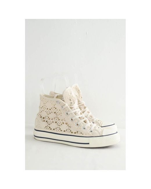 Baskets montantes Baskets beiges Converse en coloris White