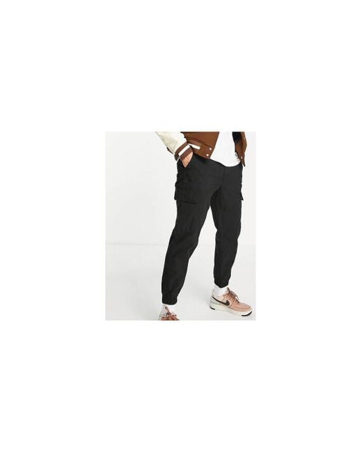 Pantalon PANTALON CARGO BLACK New Look pour homme