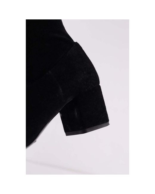 Bottes Bottes en cuir Maje en coloris Black