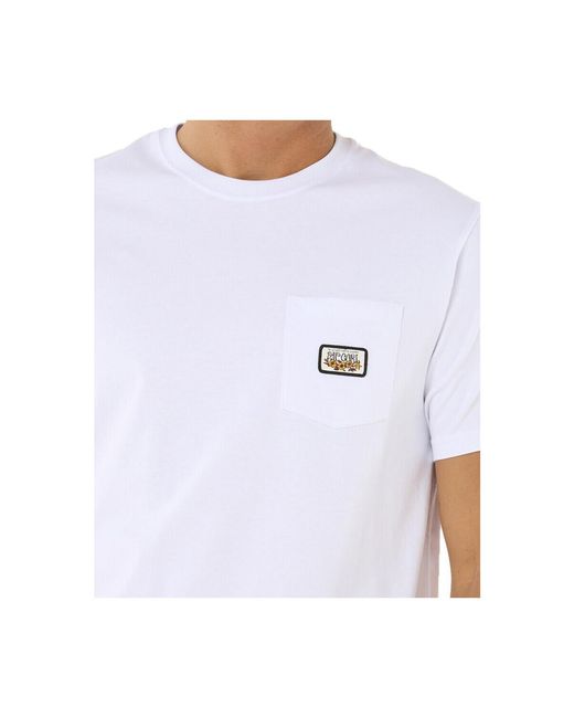 Polo _M_SURF PARADISE BADGE TEE UPDATE Rip Curl pour homme en coloris White