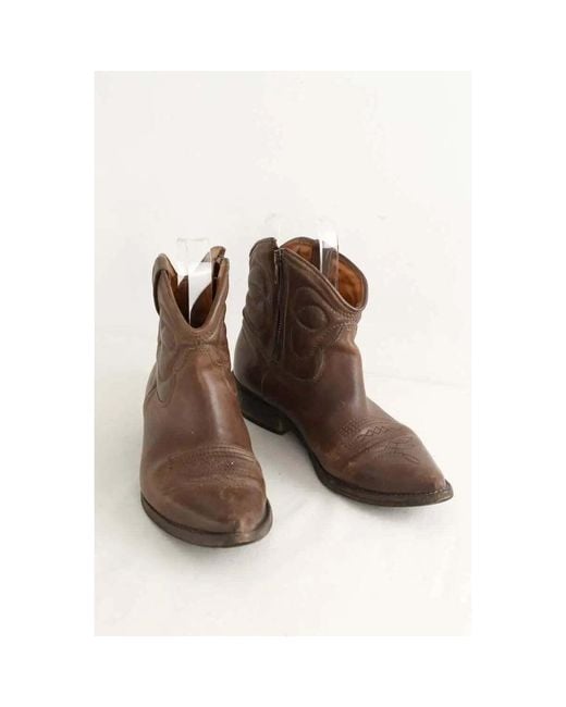 Bottines Bottes western en cuir marron Sandro en coloris Brown