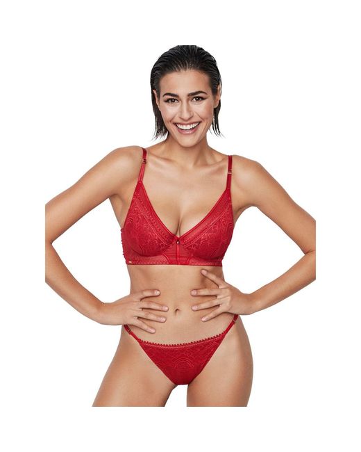 Strings String Aurum Selmark en coloris Red