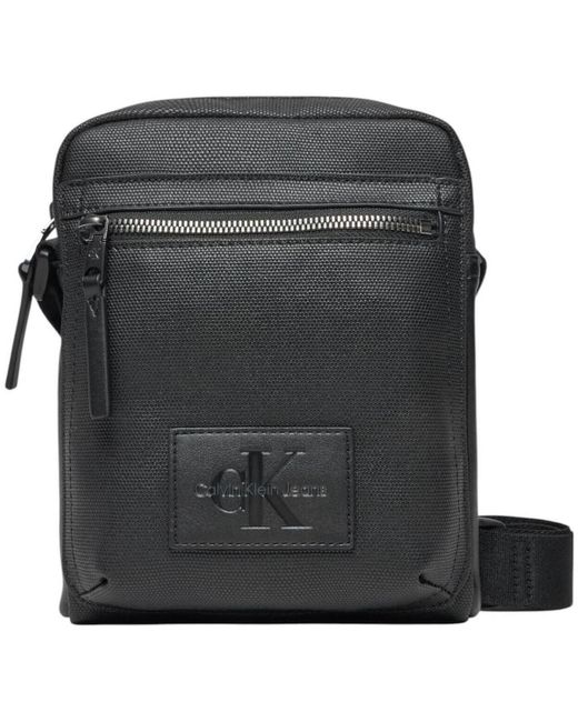 Sac Bandouliere COATED REPORTER18 K50K512995 Calvin Klein pour homme en coloris Black